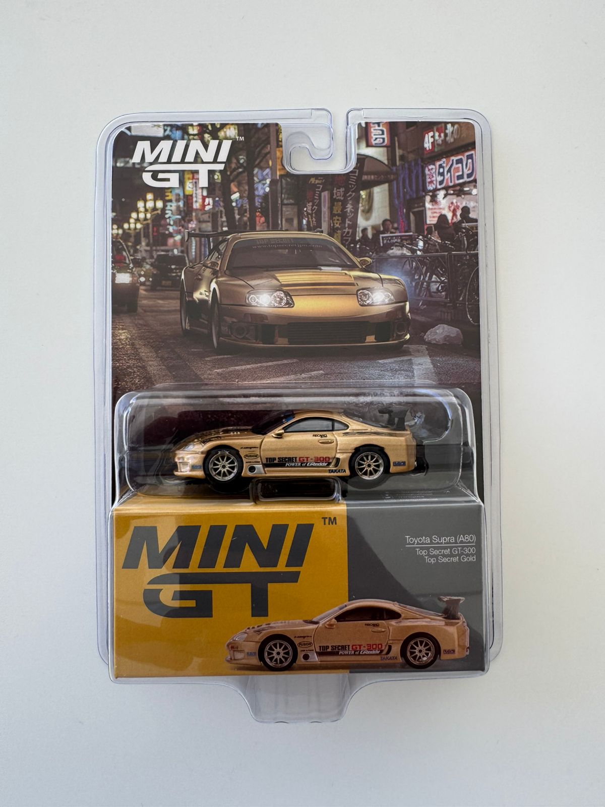 MINI GT - Toyota Supra Top Secret GT-300 Gold #961